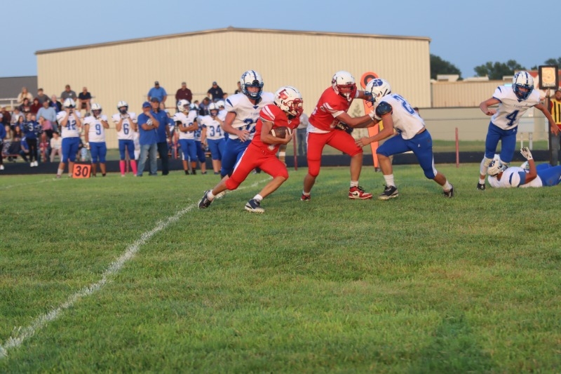 Logan USD 326 - Logan boys win season opener